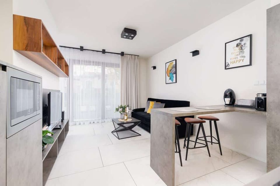 A different perspective of the open-plan kitchen and living area, highlighting its functional design.
