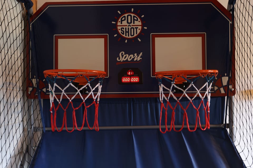 Enjoy playing pop a shot in the game room! 