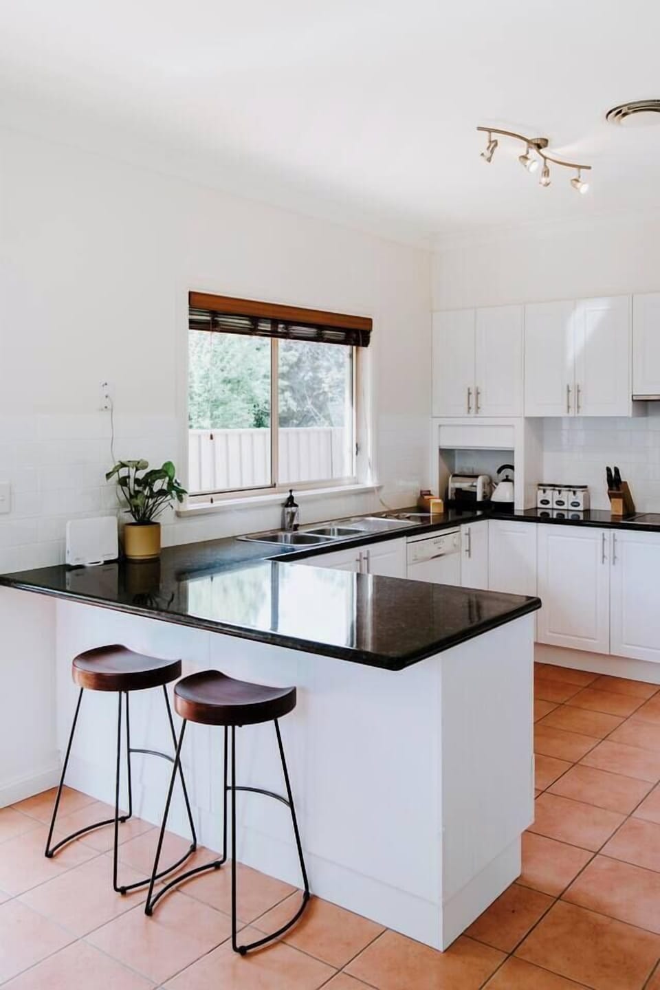 Take things slow in the mornings up at the breakfast bar with a coffee machine on hand.