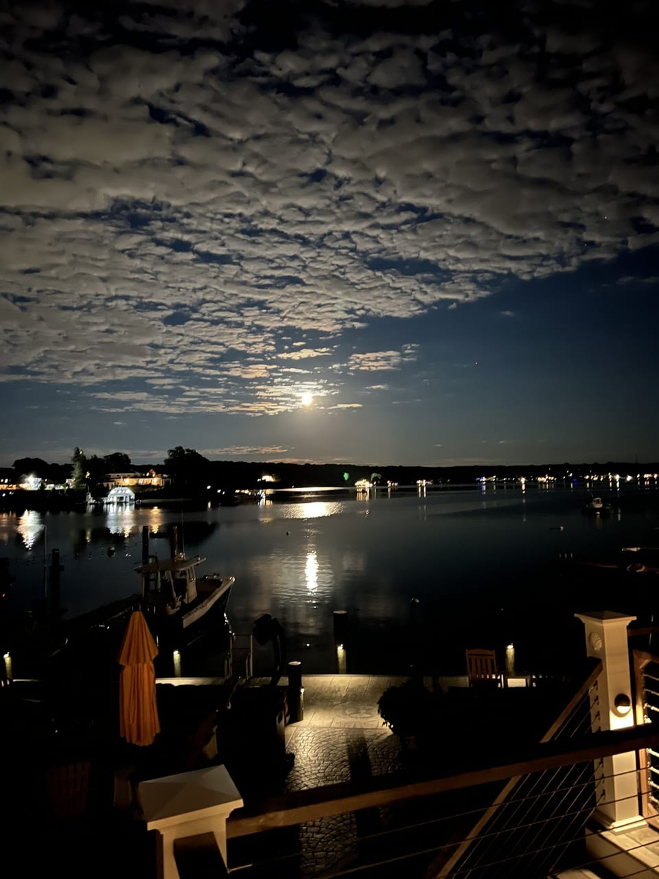 Patio view of the moonlight on the Niantic River