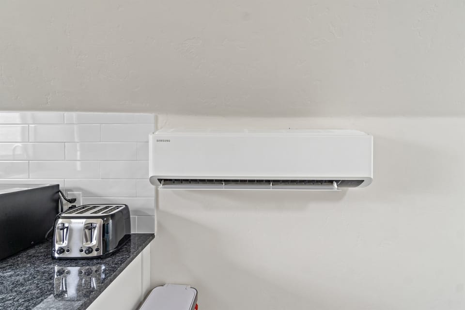 This studio comes equipped with a Samsung AC unit. Remote included for easy access from wherever you are in the studio.