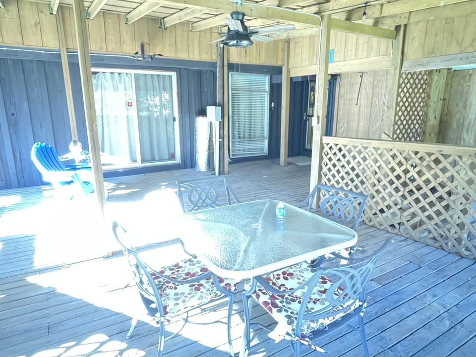 Large, covered patio to sit out & enjoy the outdoors 