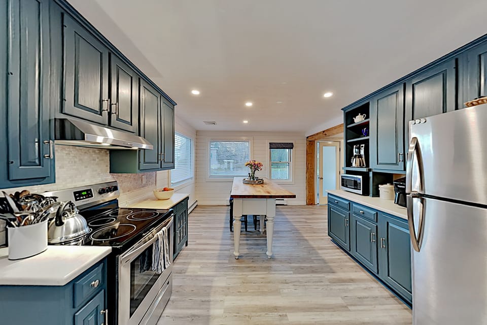 Kitchen is fully stocked with every appliance you will need.