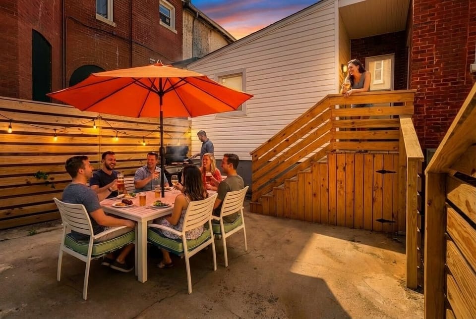Fire up the grill and enjoy drinks under the umbrella on the patio.