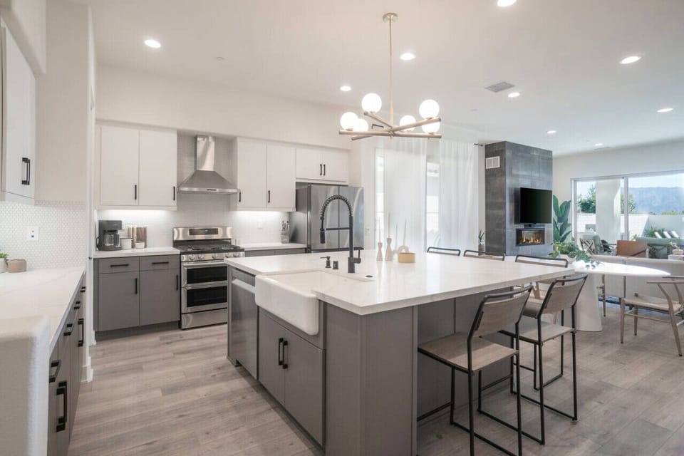 Bright kitchen & dining space w/ island seating & modern finishes