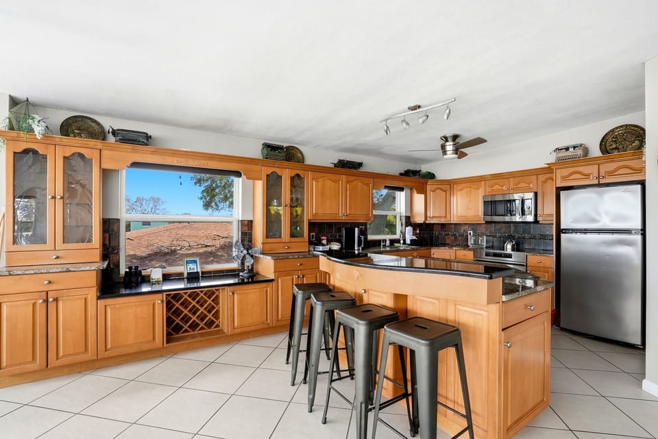Everything you will need for either a home cooked meal,  bringing in Uber Eats,  making your morning coffee or a margarita are all available to you in this fully stocked kitchen.