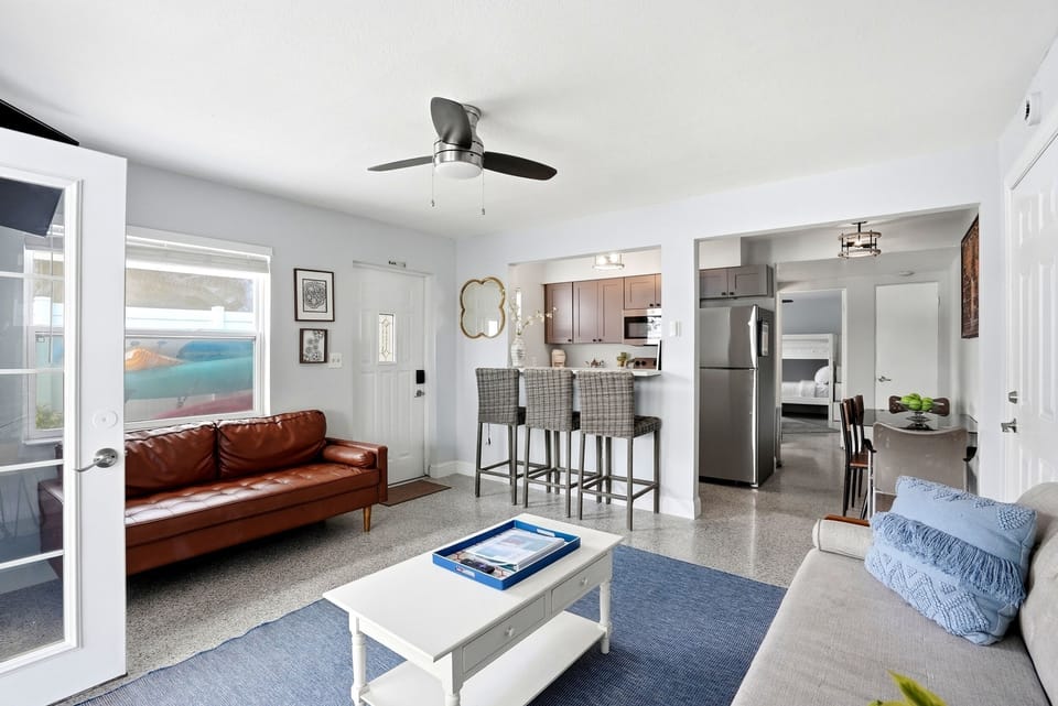Unit 1 living room with 2 couches