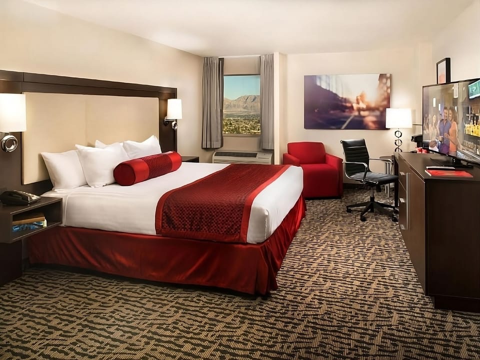 Stretch out on the plush king bed with city views.