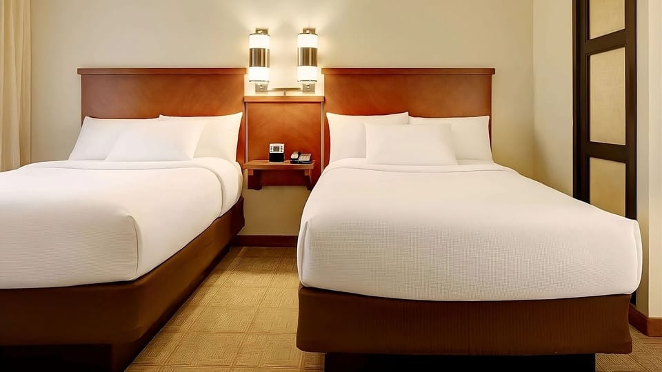 Stretch out comfortably in a clean, airy double-bed setup.