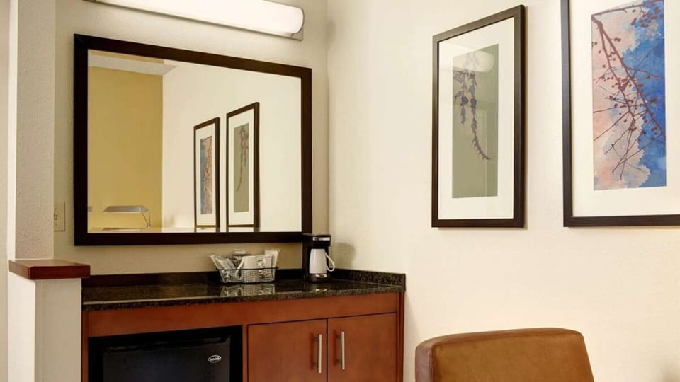 Refresh anytime with an in-room counter, mini-fridge, and coffee.