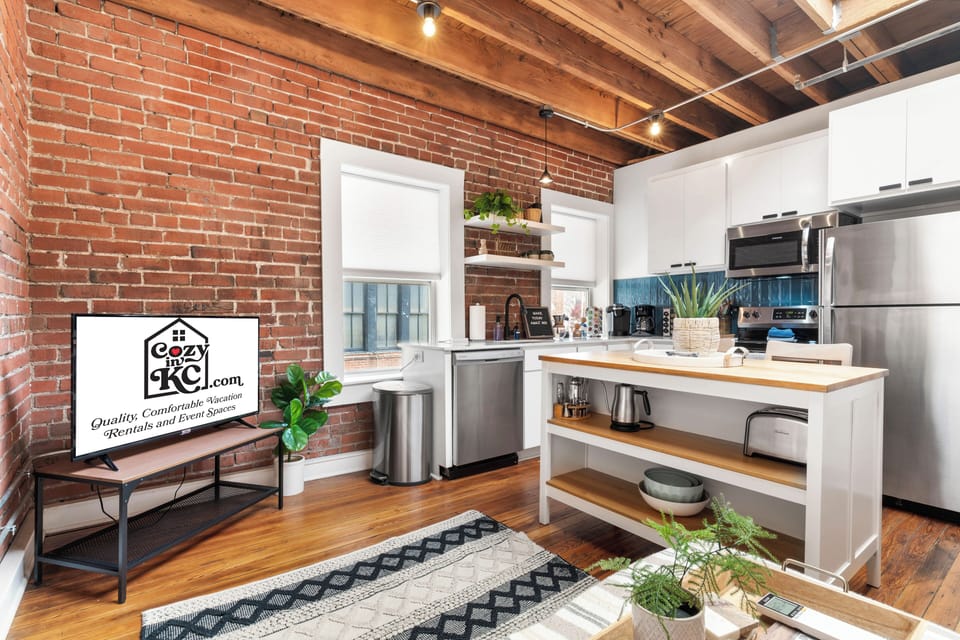 Cozy interior with exposed brick and skylights