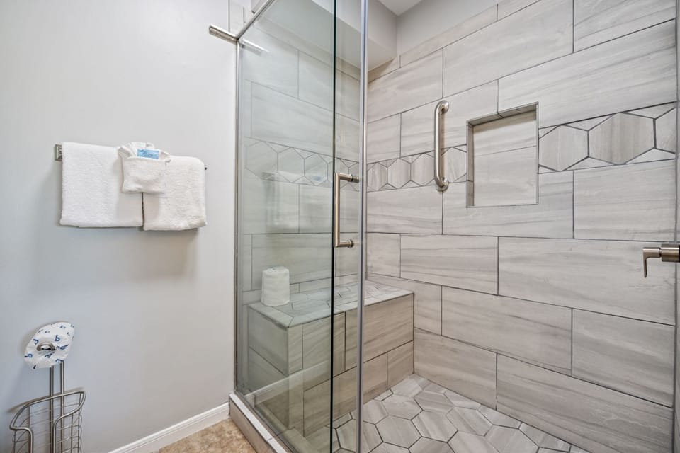 Master Bathroom offers a shower & double sinks.