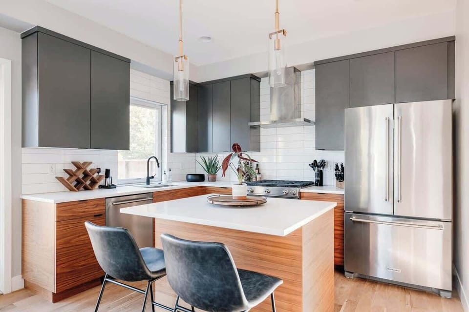 Kitchen with island and bar seating