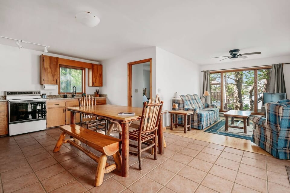 Cozy up and enjoy the expansive views from your living and dining room.