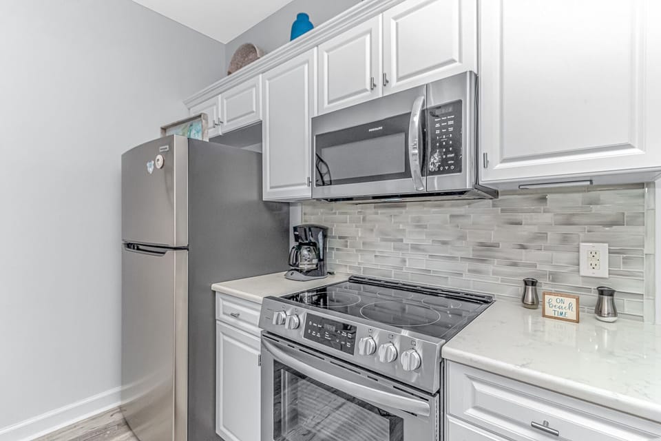 Main villa fully stocked kitchen with new stainless appliances