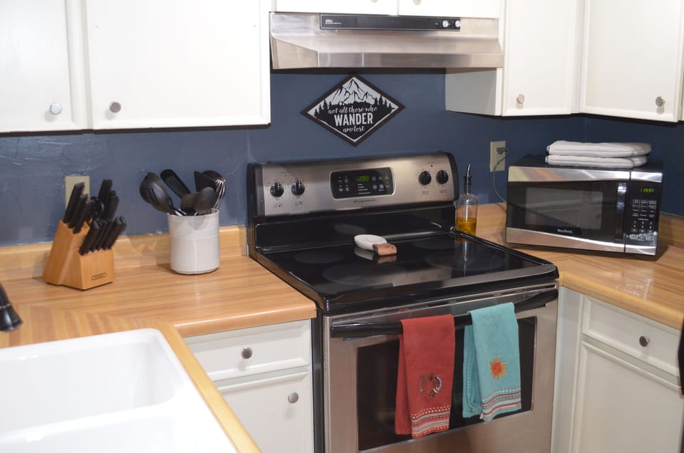 The kitchen is fully equipped with everything you need to cook meals at home