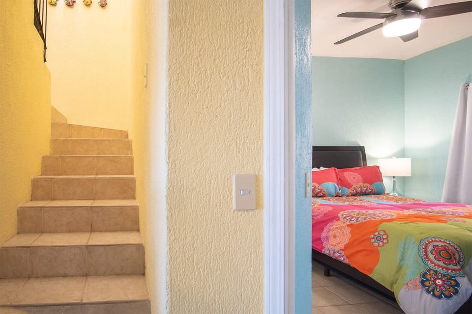 stairs leading to the upstairs bedroom