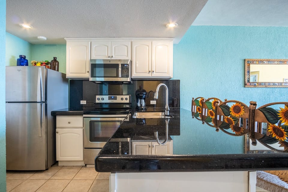 dark countertops in the complete kitchen