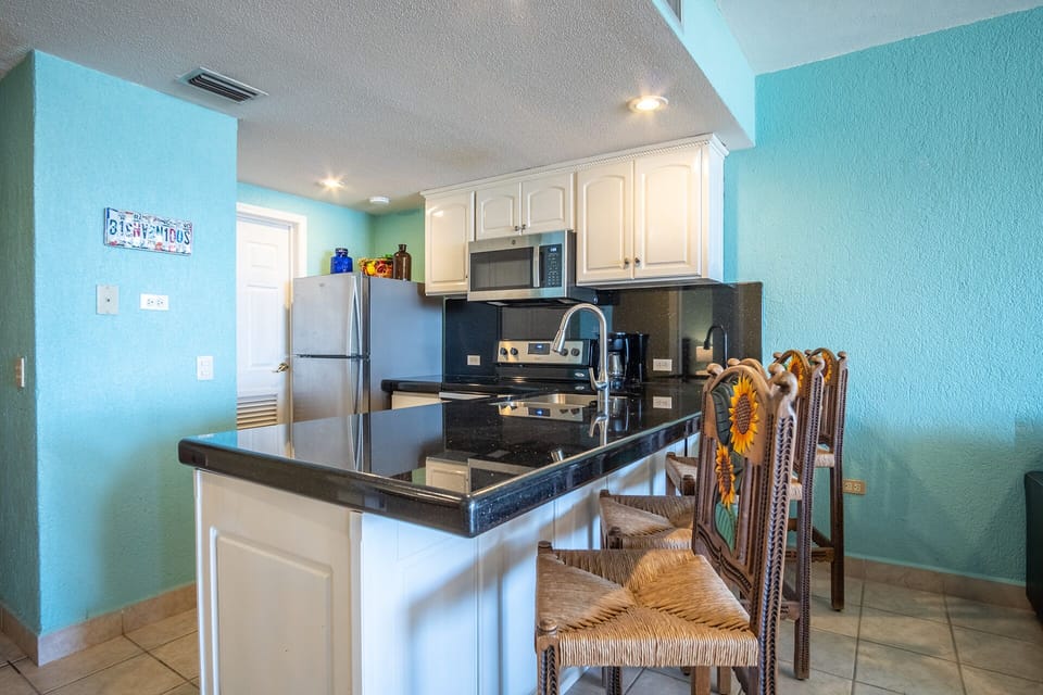 high backed stools at the kitchen counter