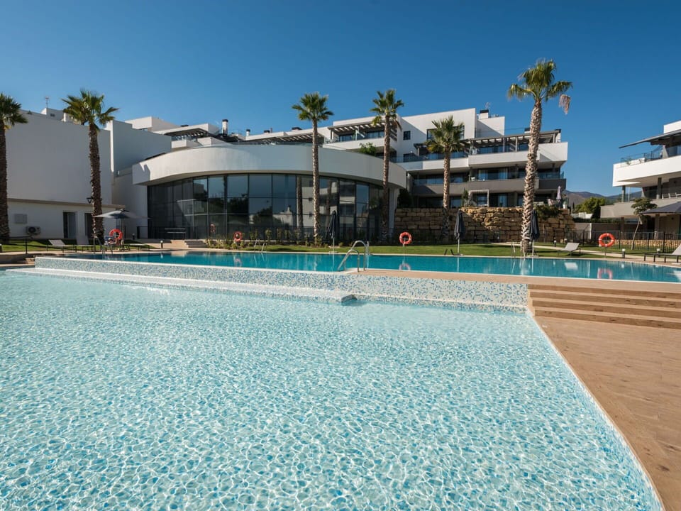 Sky, Water, Building, Azure, Plant, Swimming Pool, Tree, Leisure, Aqua, Arecales