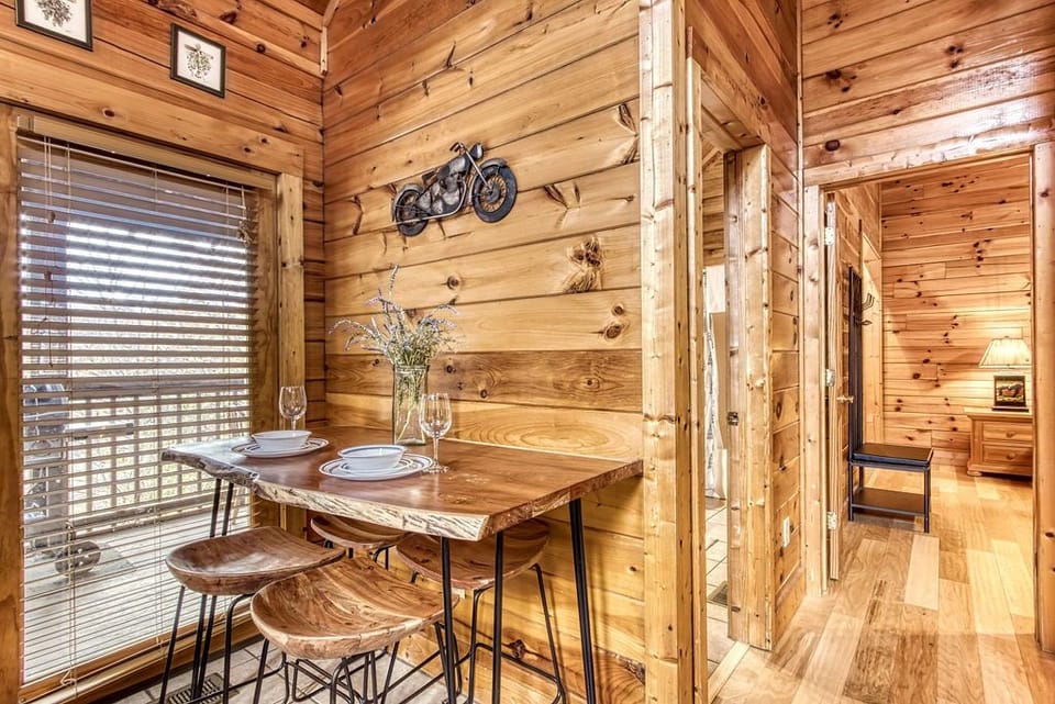 Live edge table seats 4, with seating for 4 more at counter, table for 4 on deck