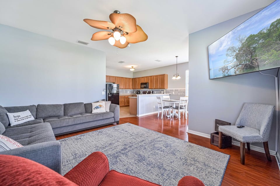 HSRP1 - Family room with comfortable seating and 65" flat screen TV