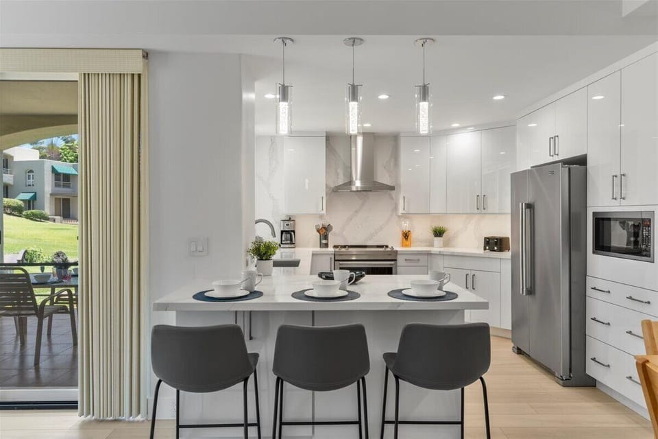 Seating for three at the breakfast bar