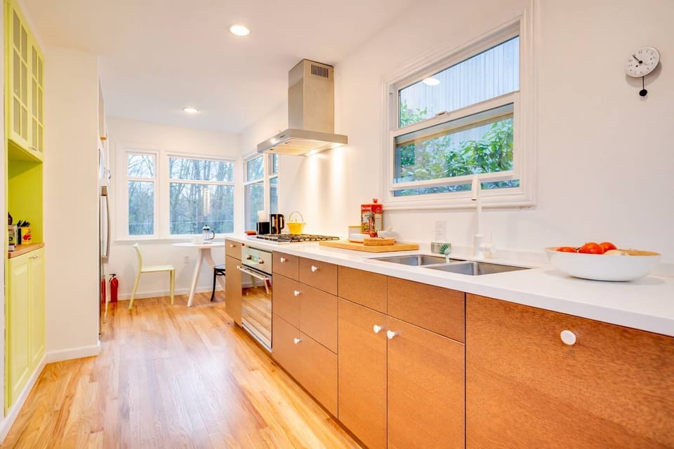 Bright and spacious kitchen with sleek counters, modern appliances, and plenty of room to cook and gather.