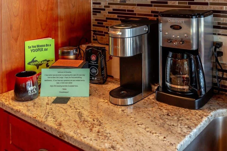 The Bear Den is stocked and ready — premium coffee setup and the comforts of home waiting for you after a day on the Lake Superior shoreline