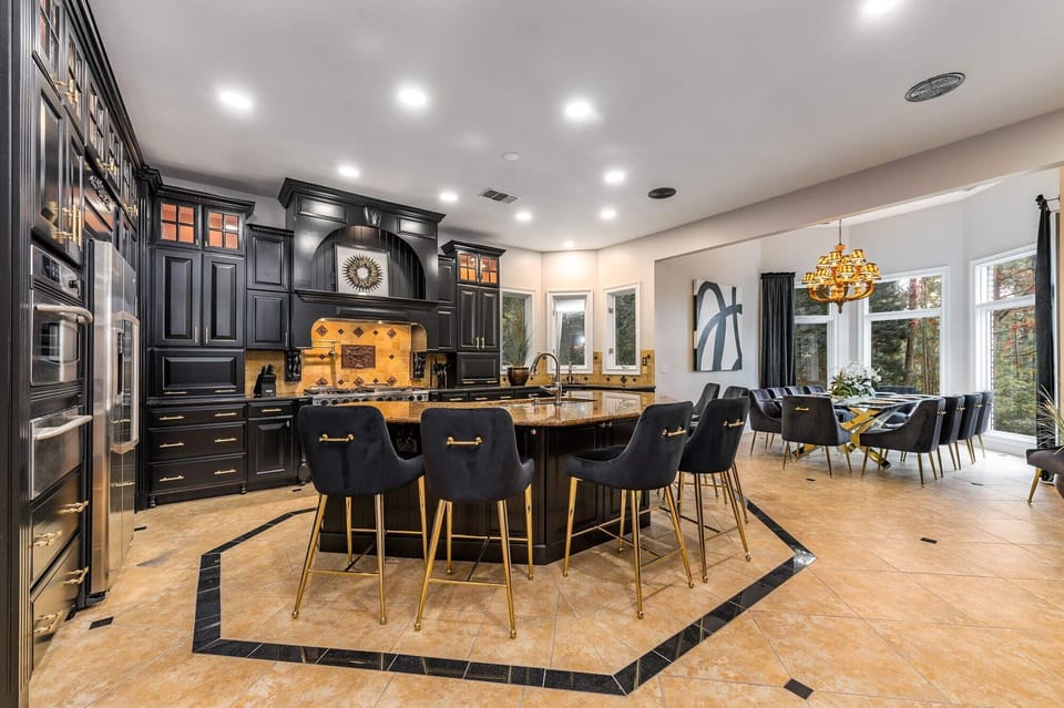 The large open kitchen invites the whole family to the table.