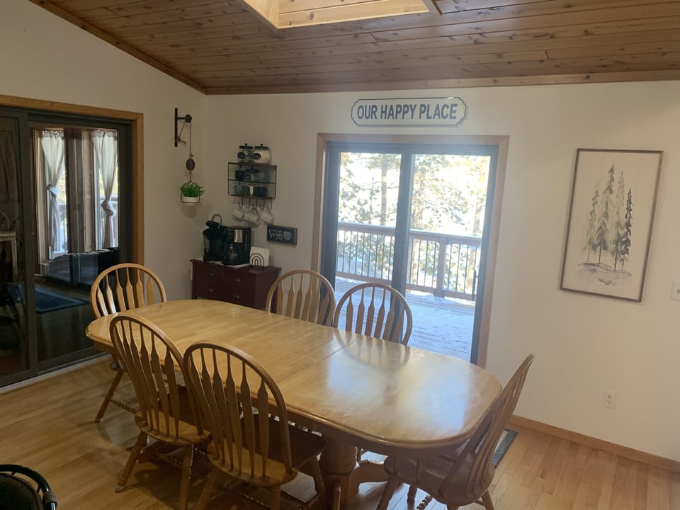 Large table and coffee bar. 