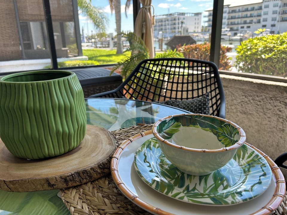 Enjoy bayside water views from your private screened in lanai.  