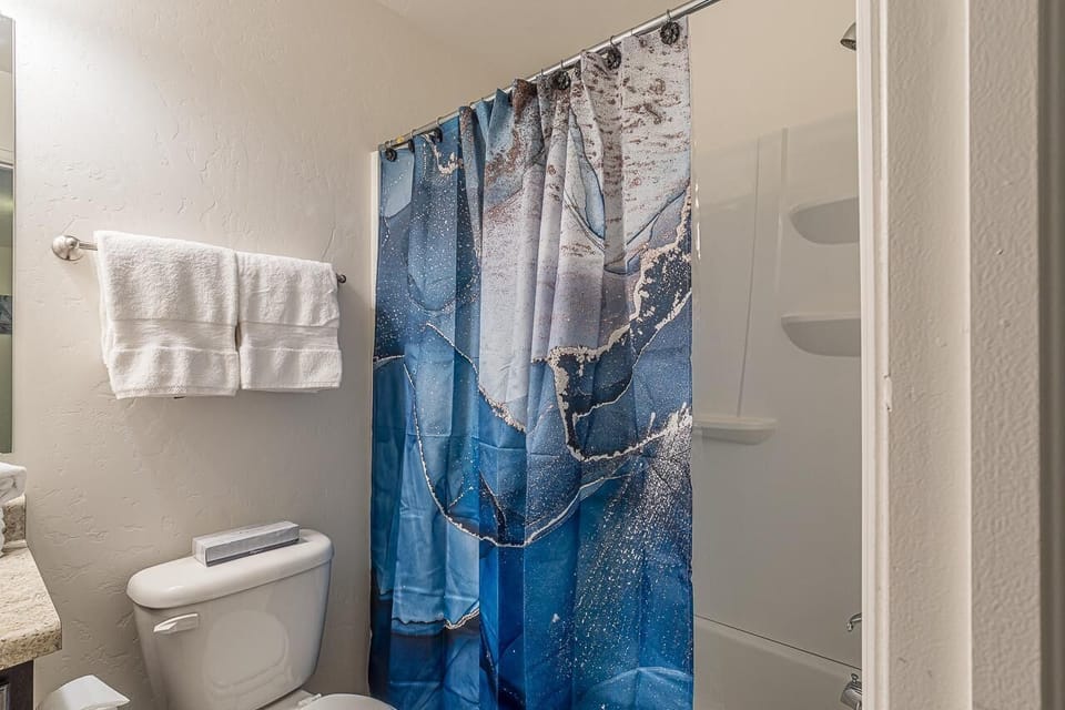 Common full bath with tub and shower