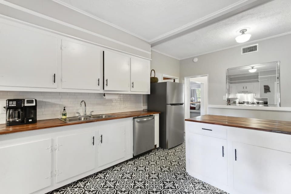 Plenty of counter space in the well stocked Kitchen.