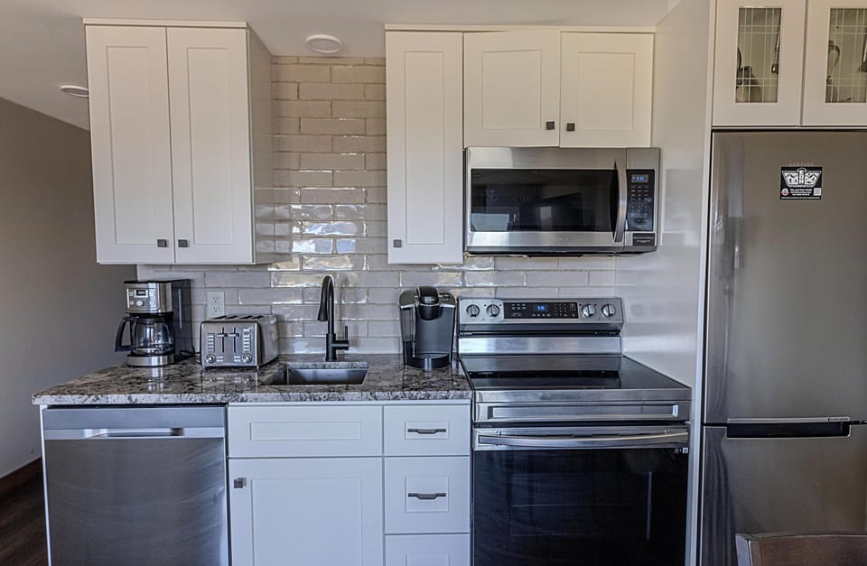 The modern kitchen is a great place to make a snack, a gourmet meal, or anything in between!