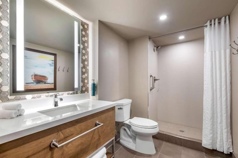 Refresh under a spacious walk-in shower after outdoor adventures.