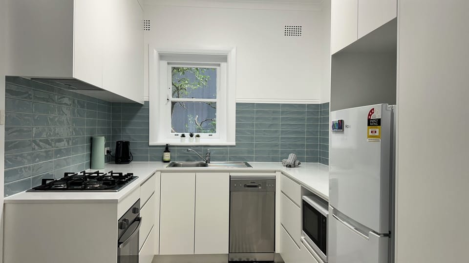 Brand new kitchen with dishwasher, oven, stove, microwave and refridgerator