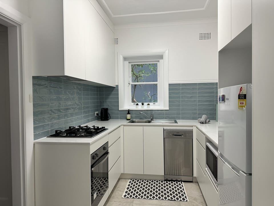 Brand new kitchen with dishwasher, oven, stove, microwave and refridgerator