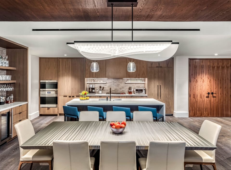 Open floor plan. Kitchen island seats 4. Gorgeous dining table seats 8.