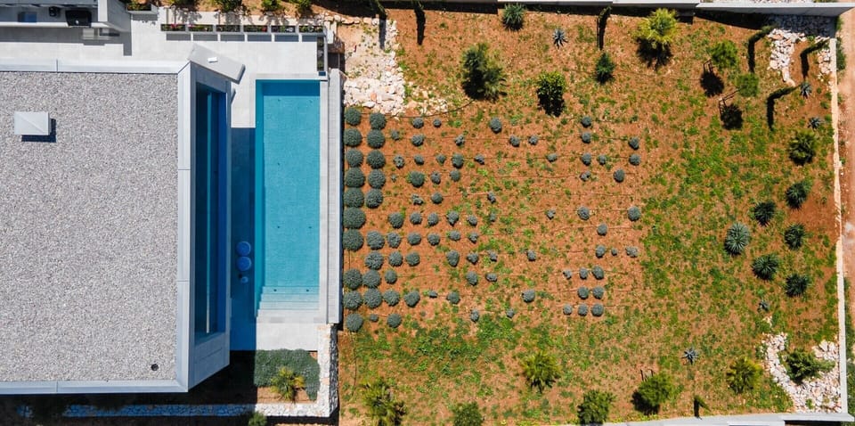 Aerial view of Croatia luxury family villa with private pool and garden for vacation and rent on Hvar island