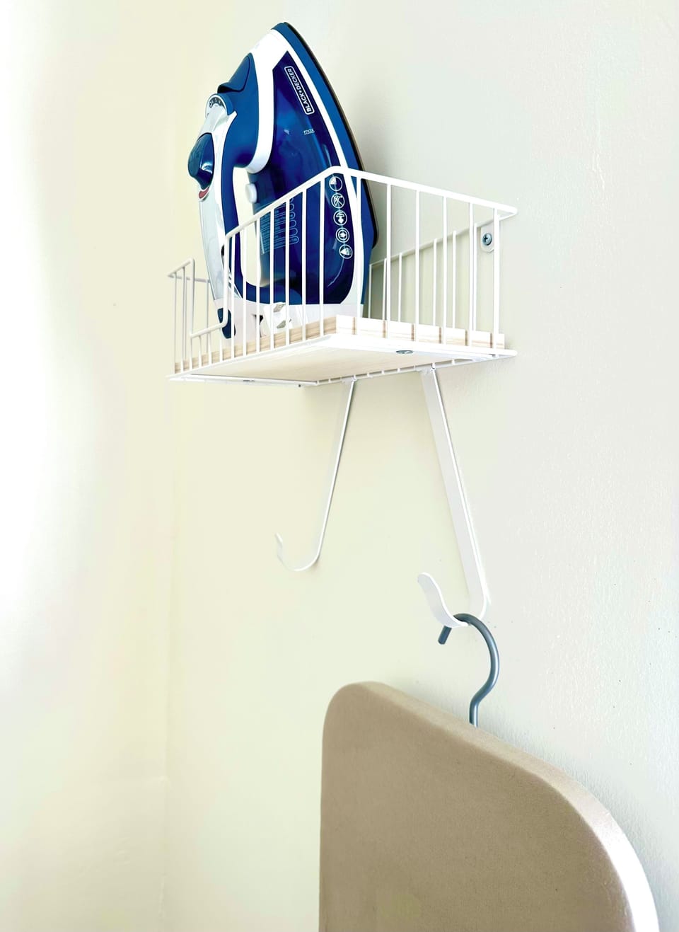 Iron and Ironing Board in Laundry Room