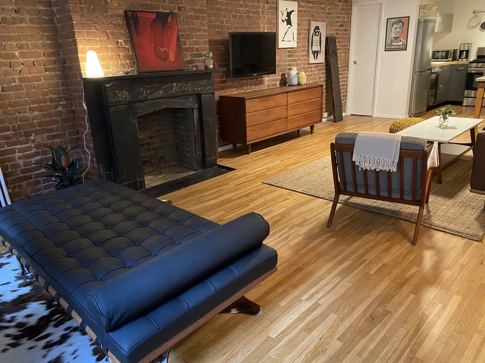 TV with Netflix, Apple TV, Hulu. Original fireplace (non-working) from 1853!