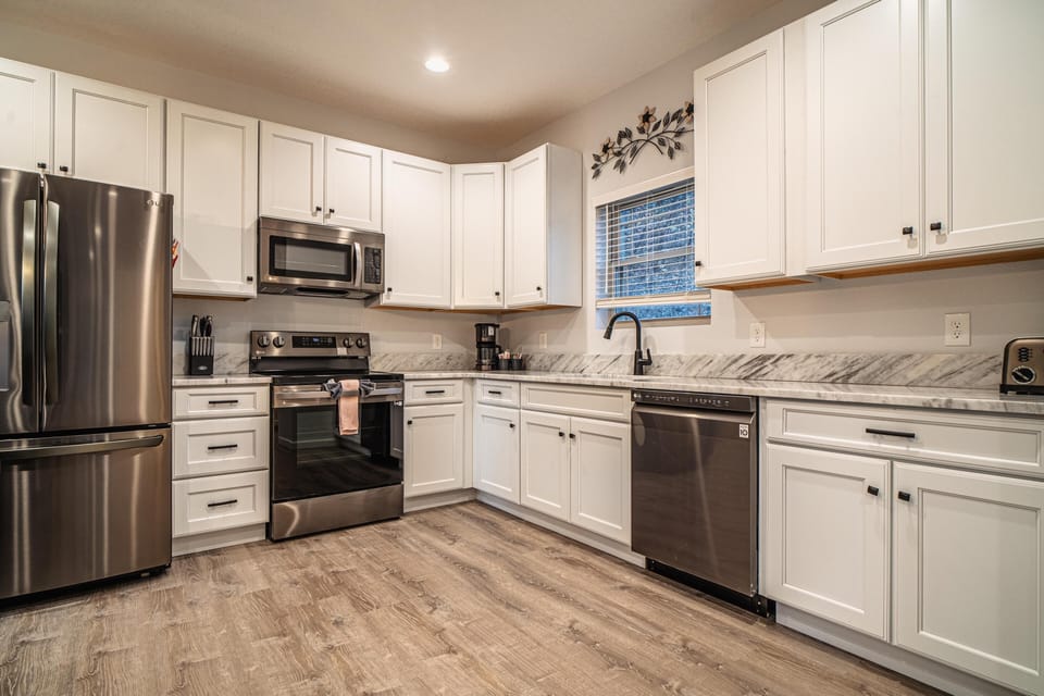 Modern kitchen equipped with all your needs to help enjoy your stay.