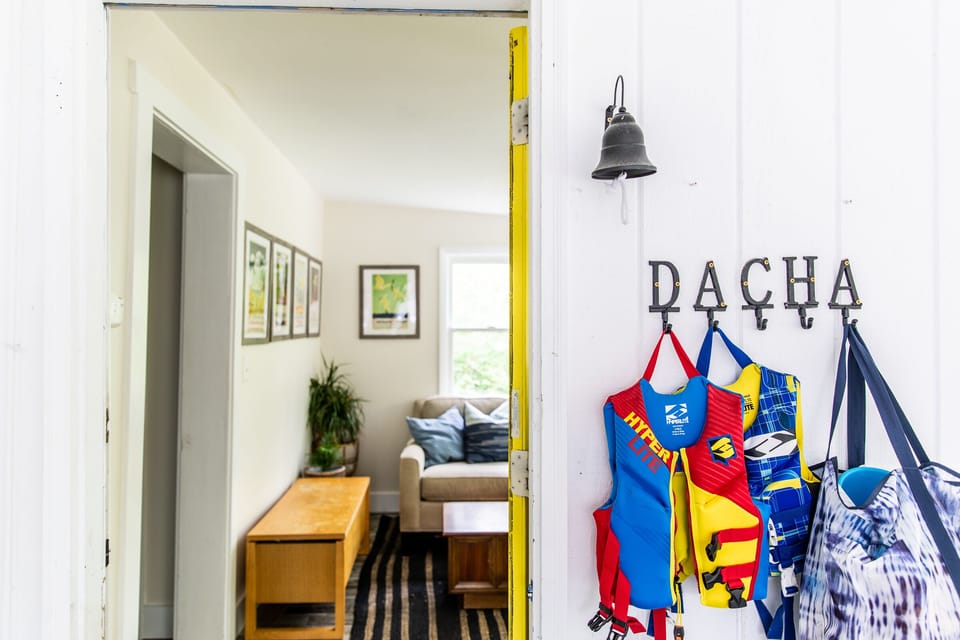 The sun room has a door to the screened in porch.