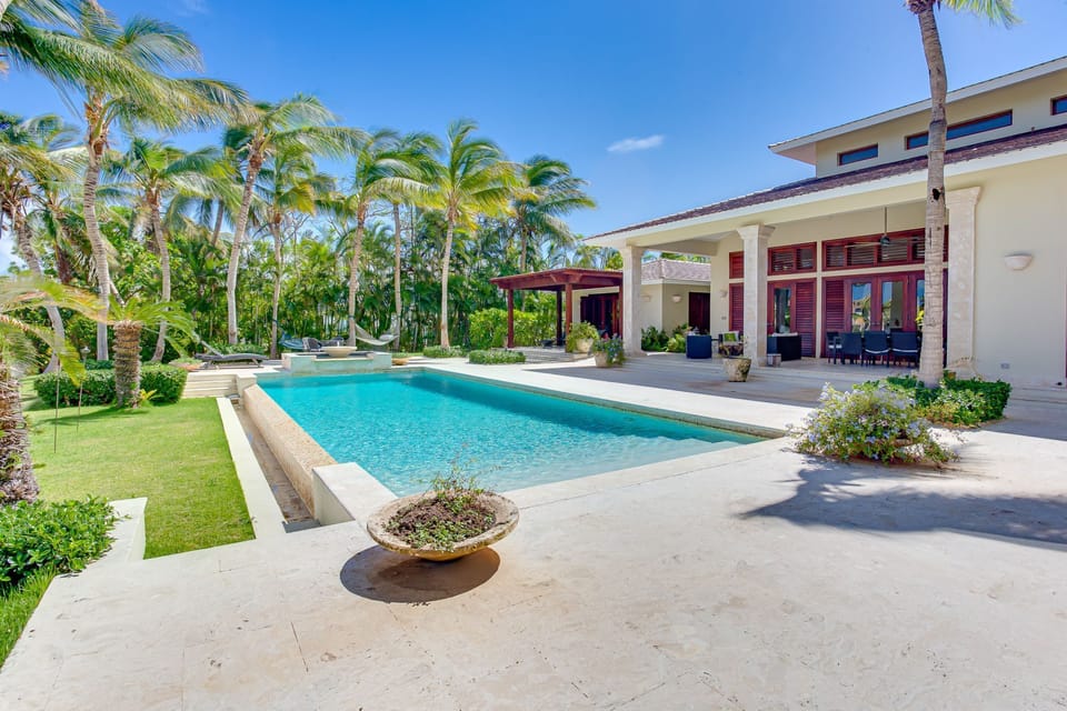 Pool area with outdoor living and great golf views