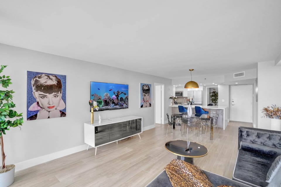 Living area, dining area, Roku tv, balcony access 