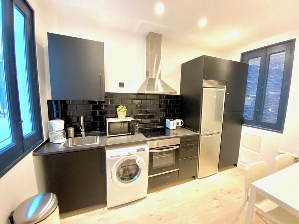 View of the kitchen with appliances