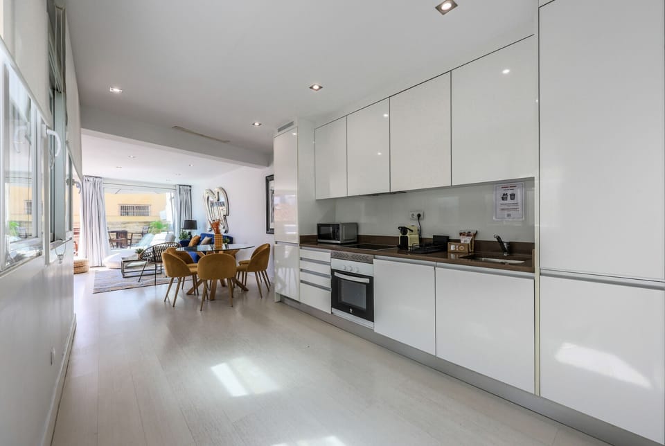 View of the kitchen area with appliances