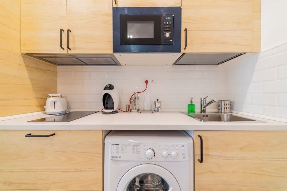View of the kitchen with appliances