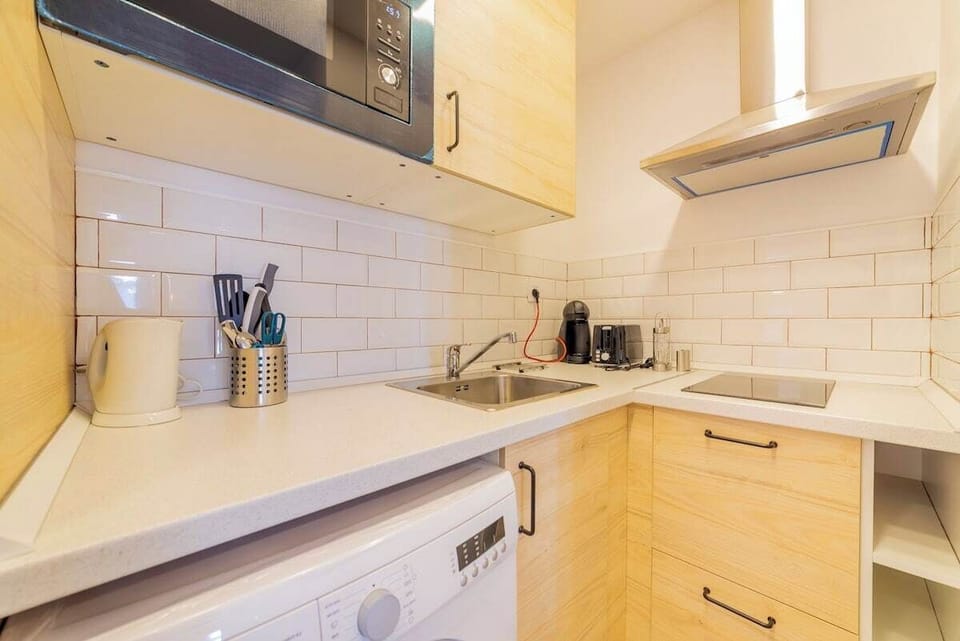 View of the kitchen with appliances